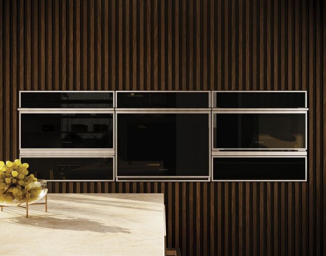 Dark wood walls with minimalist style appliances