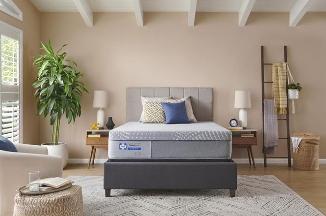 front view of a modern bedroom with a sealy mattress