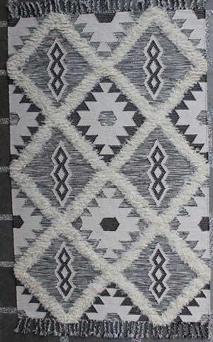 grey, black, and white rug