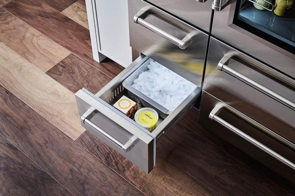 Kitchen Featuring a Sub-Zero PRO 30.4 Cu. Ft. Stainless Frame Built In Side-by-Side Refrigerator