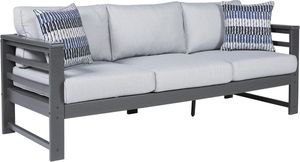 front view of the Signature Design by Ashley® Amora Charcoal Grey Sofa, a grey plastic outdoor sofa with light blue cushions
