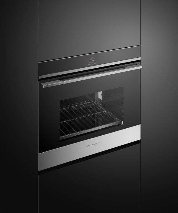 Fisher Paykel oven built into black wall
