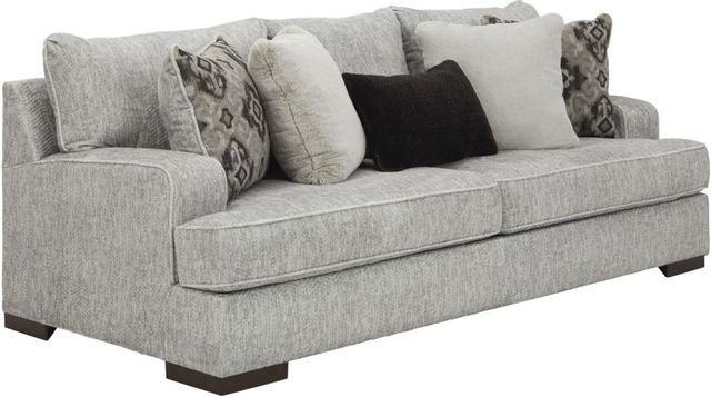The Benchcraft Mercado sofa with throw pillows 