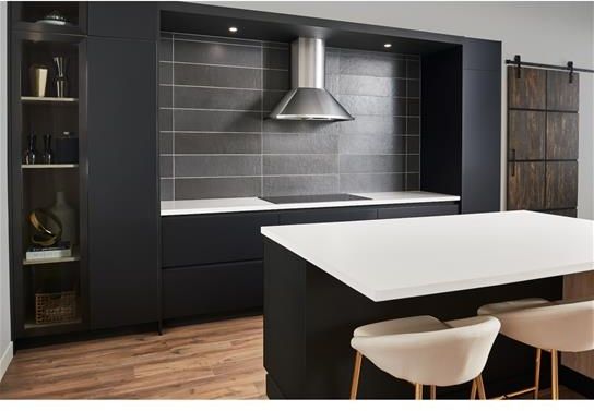 Kitchen Featuring a 36" Stainless Steel Convertible Wall-Mount Chimney Range Hood