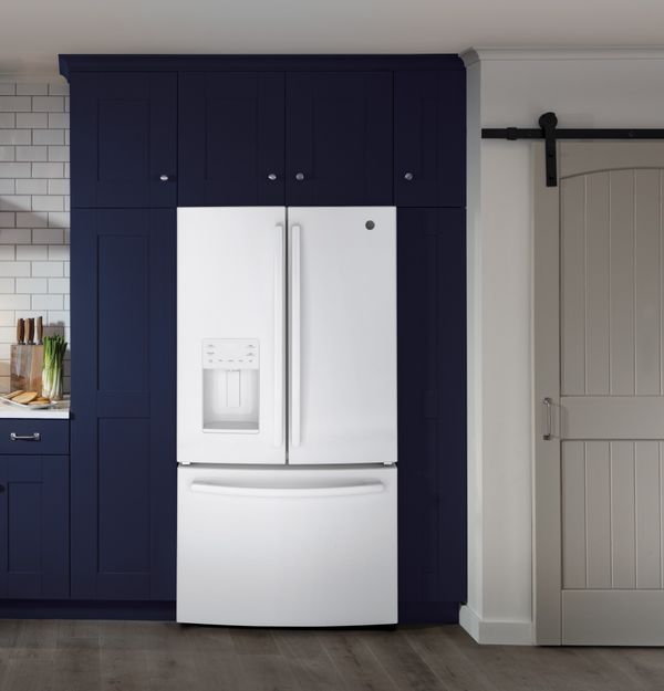 Kitchen Showcasing a GE® 25.6 Cu. Ft. High-Gloss White Freestanding French Door Refrigerator