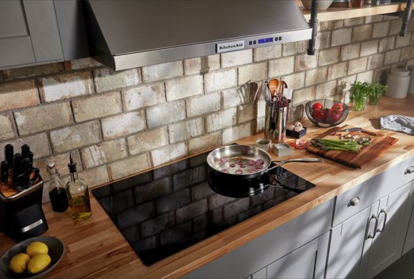 Kitchen Featuring a KitchenAid 30" Black Electric Cooktop