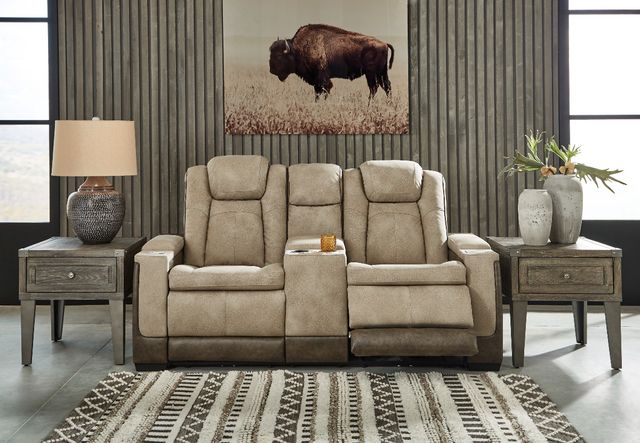 front view of a rustic living room with a beige reclining loveseat