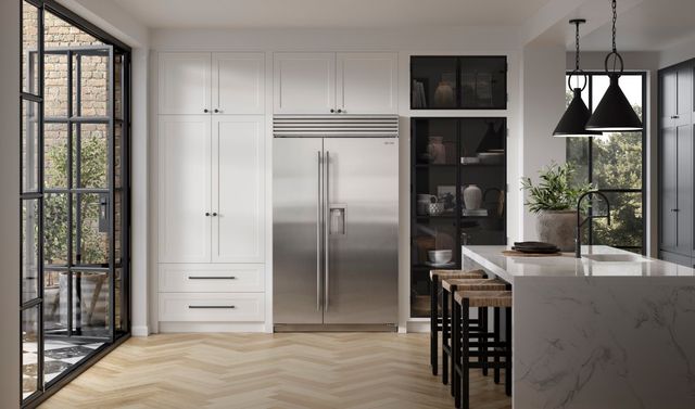 front view of a modern kitchen with a large 48 inch refrigerator 