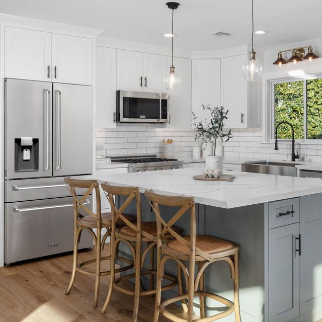 zline refrigerator and microwave in a modern white kitchen