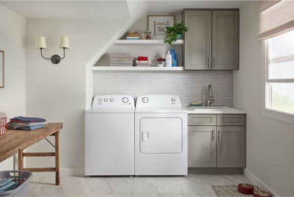 Laundry Room Featuring an Amana 3.8 Cu. Ft. White Top Load Washer