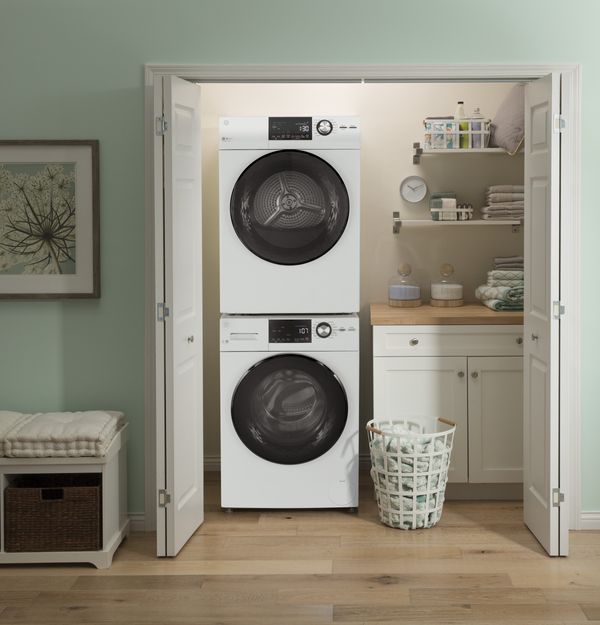 Laundry Room Featuring a GE White Front Load Laundry Pair