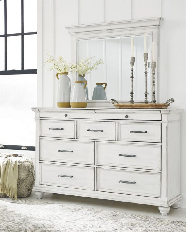 front view of a white dresser and mirror set