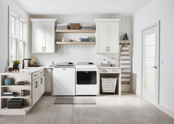 Kitchen featuring a Maytag 7.4 Cu. Ft. White Front Load Gas Washer and Dryer