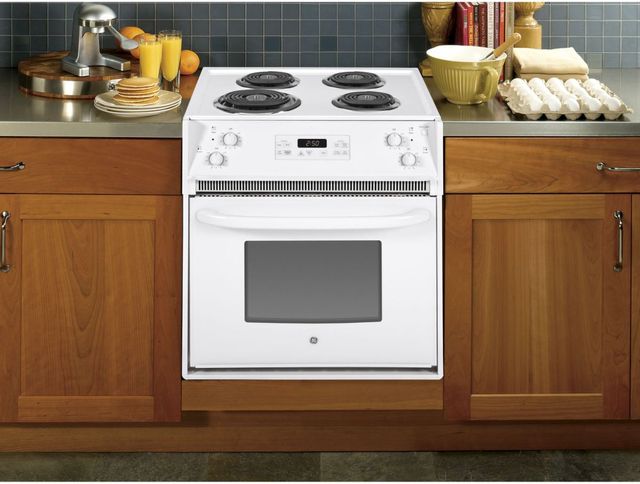 white ge drop in electric range in a kitchen styled with breakfast foods