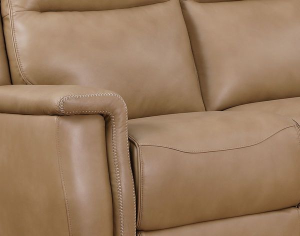 closeup view of a beige faux leather sofa