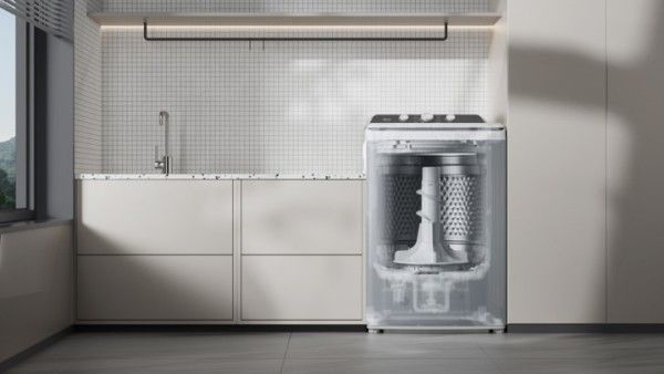 front view of a dramatized front load washer with a transparent front to show the agitator inside