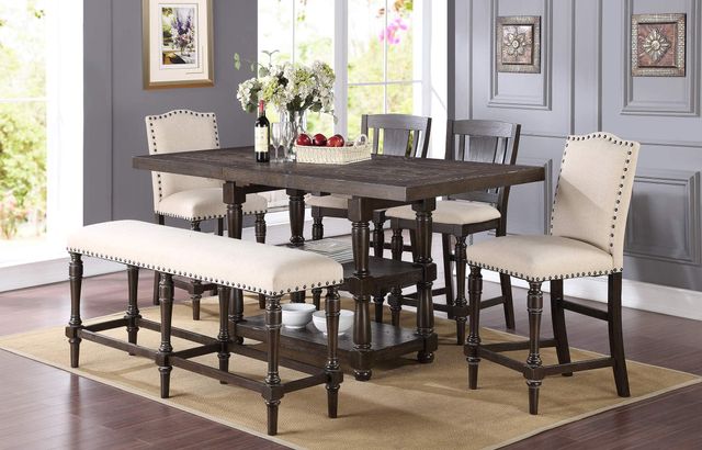 front view of a transitional dining room with a dark wood table, and light wood upholstered seating, including a bench and chairs