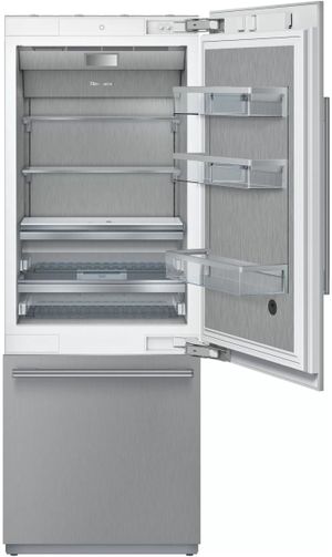 The interior of a Thermador built in refrigerator is shown