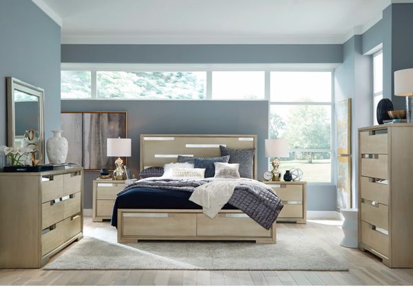 front view of a modern luxury bedroom with a beige and mirrored matching bedroom set and light blue walls