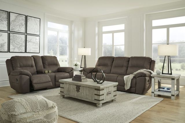 front view of a modern farmhouse living room with brown fabric sofa and loveseat, and whitewashed wood coffee and end tables