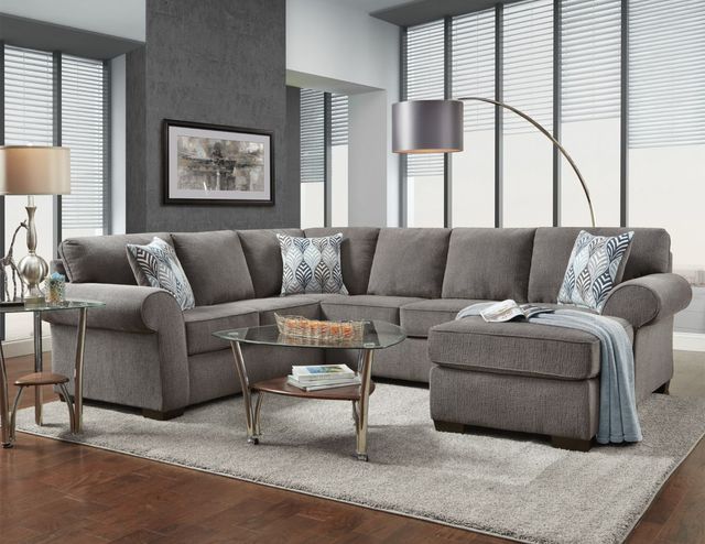 front view of a contemporary living room wit ha modern beige sectional sofa