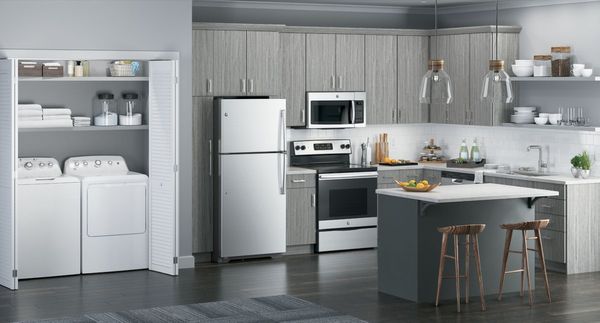 Laundry room featuring GE White Laundry Pair