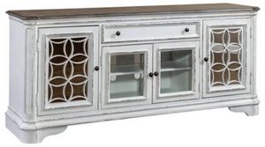 front view of the Magnolia Manor 74" TV Console, a whitewashed wooden tv console with glass doors