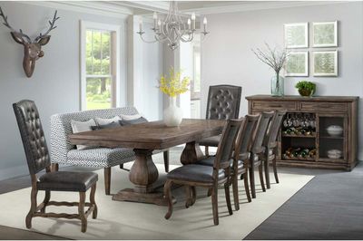 front view of the Gramercy 7-Pc Dining Set in a rustic dining room