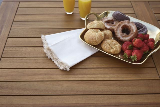 closeup of wood outdoor dining table
