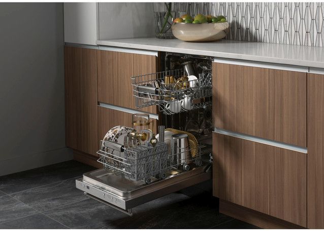 front view of an opened 18" dishwasher with its racks extended out