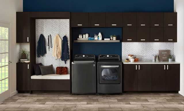 front view of a modern laundry room with a dark grey washer and dryer