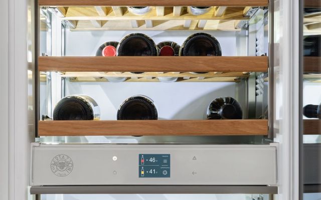 close up of wine cooler with bottles in it