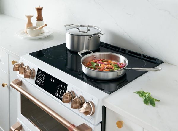 Kitchen showcasing Café Matte White 30" Slide In Double Oven Electric Range