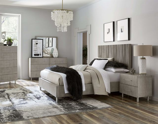 side view of a modern glam white bedroom with a matching bedroom set
