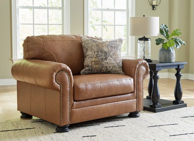 front view of a large leather chair in a modern bedroom corner
