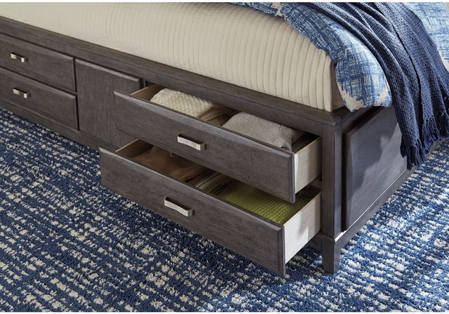close view of the frame of a storage bed with two drawers pulled out