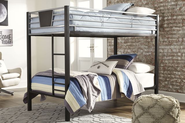 standing view of a modern kids room with a black metal twin over twin bunk bed in the center, with blue, grey, and white accents throughout