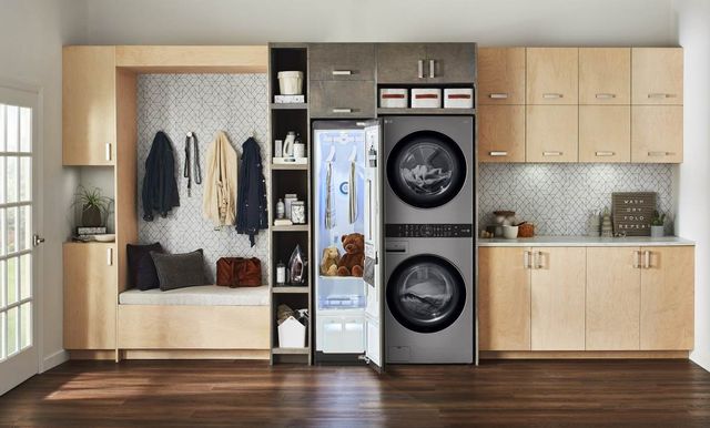 Stacked laundry unit in a brightly lit laundry room