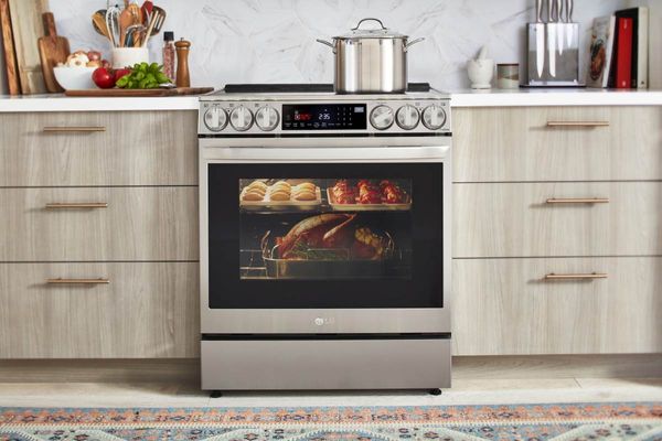 Kitchen Featuring a smart LG 30" PrintProof™ Stainless Steel Slide-In Electric Range