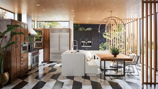 front view of a modern contemporary kitchen with a large sub-zero 48 inch refrigerator