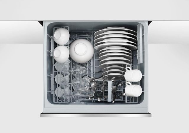 Inside of Fisher & Paykel dishwasher loaded with dishes