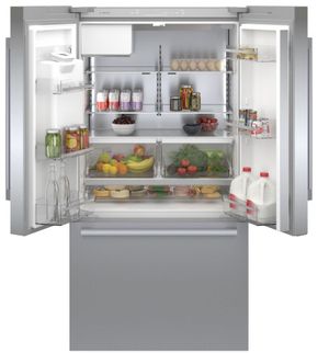 front view of the Bosch® 500 Series 21.6 Cu. Ft. Stainless Steel Counter Depth French Door Refrigerator full of food