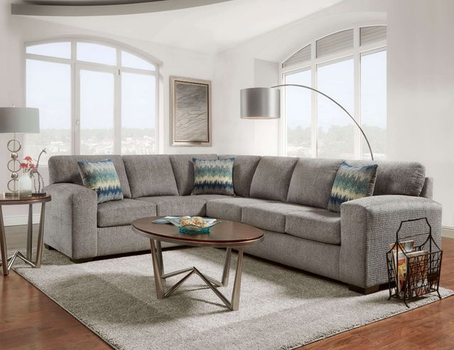 front view of a grey l-shaped sectional in a modern contemporary space