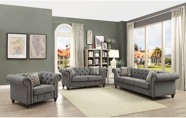 pros-cons-of-gray-sofas front view of a transitional living room with a gray sofa, loveseat, and accent chair