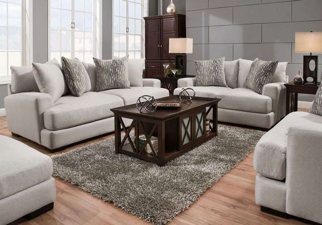 front view of a contemporary formal living room with light gray furniture and walls
