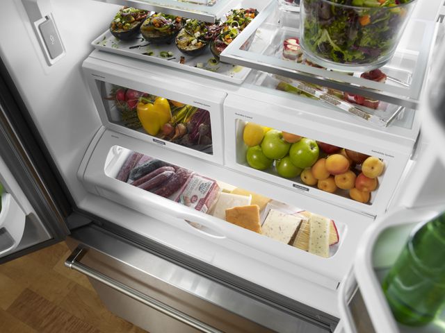 front view of the inside of the storage compartments inside a french door refrigerator