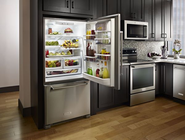 Kitchen Showcasing KitchenAid 22.07 Cu. Ft. Stainless Steel Bottom Freezer Refrigerator