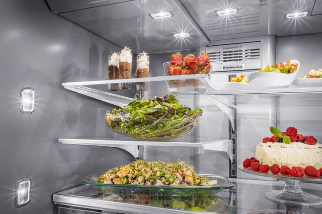front view of the inside of the kitchenaid 5 door refrigerator showing the perserva care system and various foods inside