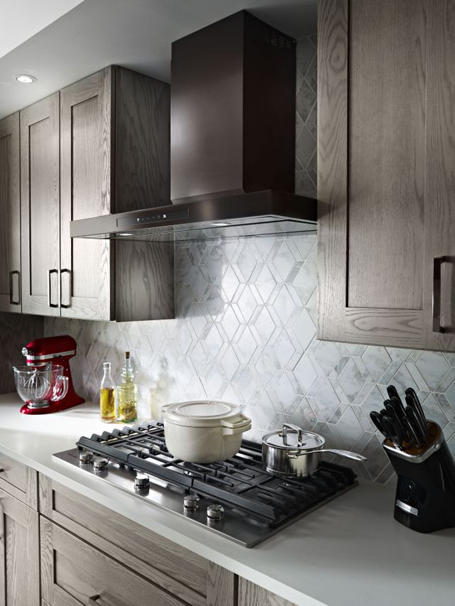 KitchenAid® 36’’ Black Wall Mount Hood lifestyle image 