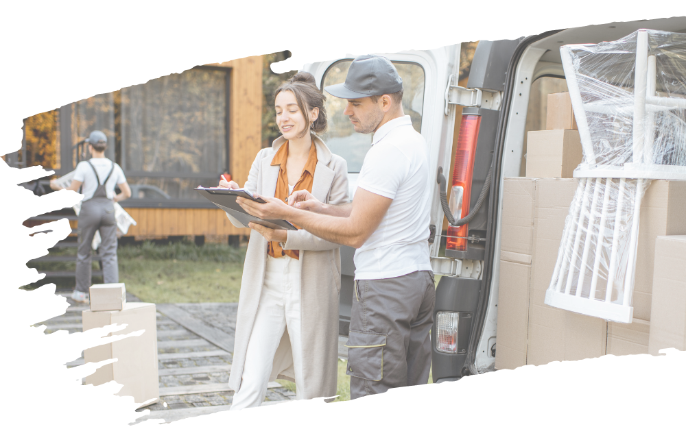 Woman signing off on delivery with service man